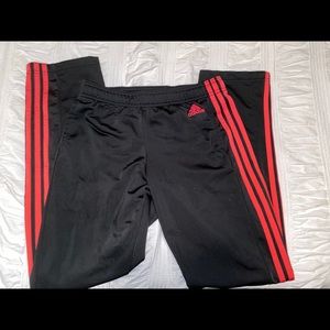 Adidas track pants with stripe